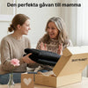 Presentidé där en massagematta överlämnas i förpackning märkt Silky Planet.