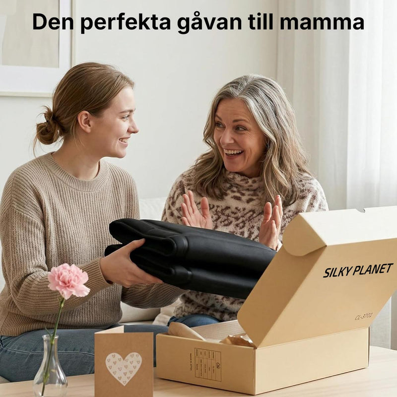 Presentidé där en massagematta överlämnas i förpackning märkt Silky Planet.