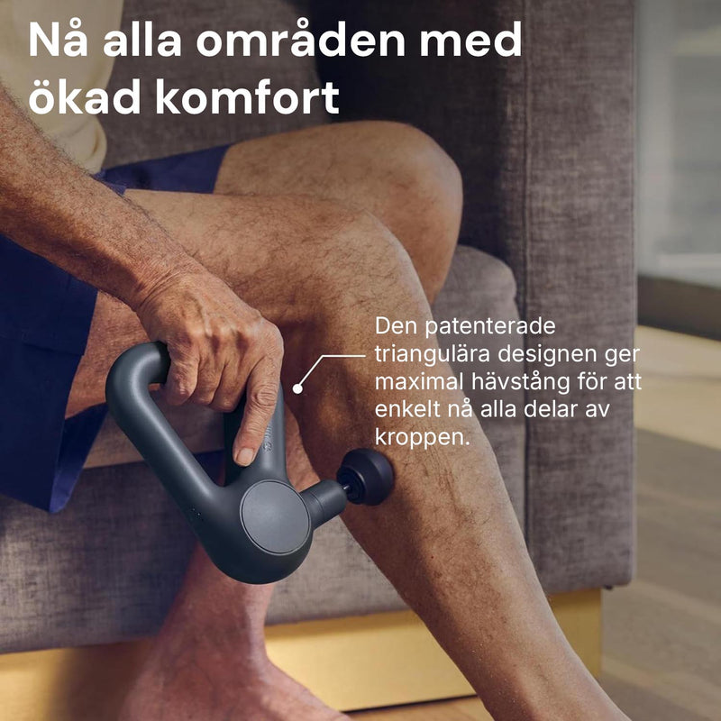 En person använder Silky Planet massagepistol Pro+ på underbenet medan den triangulära designen markeras i bild.