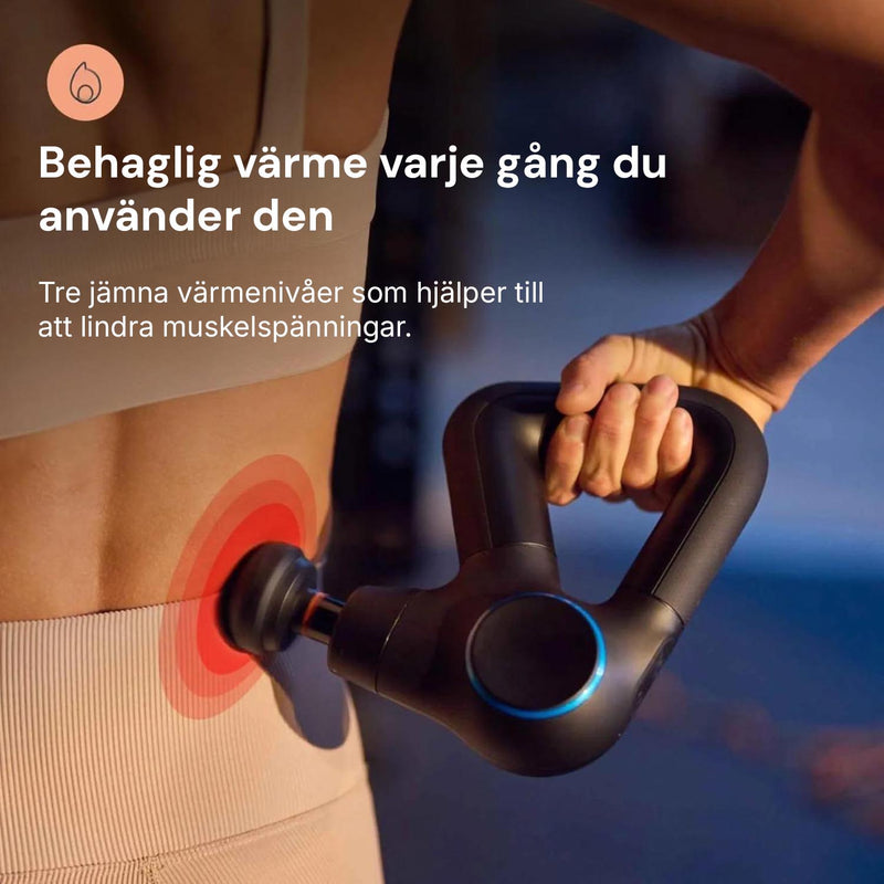 En hand håller Silky Planet massagepistol Pro+ mot nedre ryggen, illustrerat med rött sken som visar värmefunktionen.