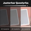 Närbild av kant på Silky Planet sminkspegel med ikoner för justerbar ljusstyrka, tre ljuslägen och uppladdningsbar funktion.