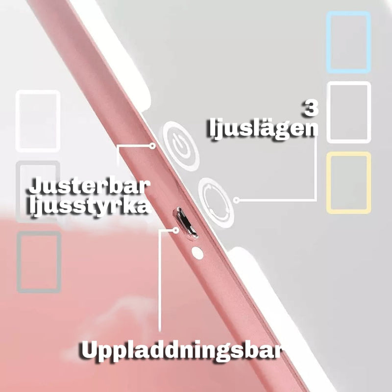 Kvinna applicerar rouge med borste framför en upplyst Silky Planet sminkspegel i roséguld.