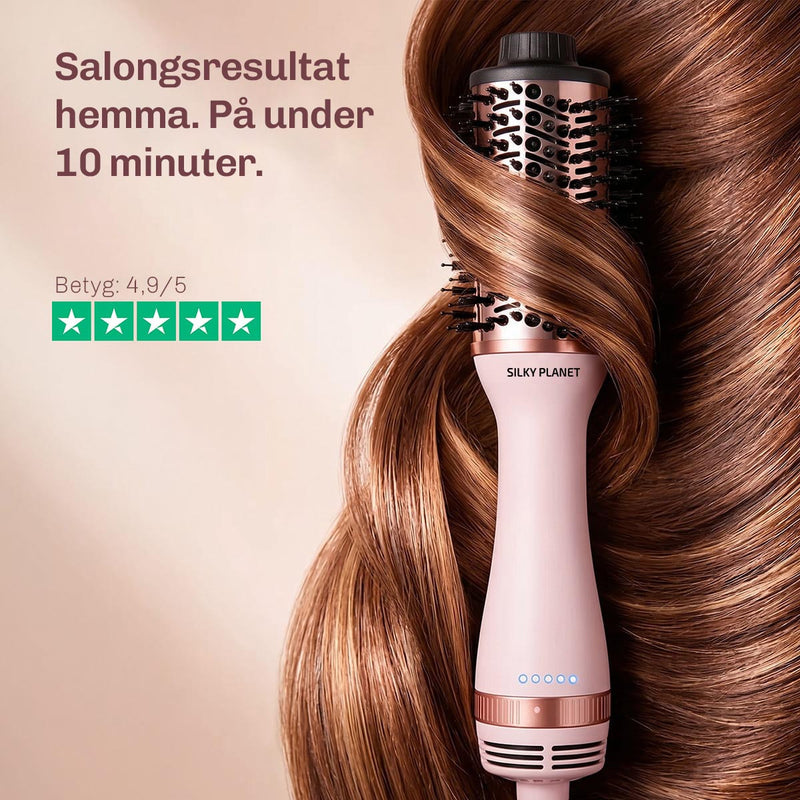 Oval titanborste med jämn värmefördelning för skonsam styling och glansigt hår.